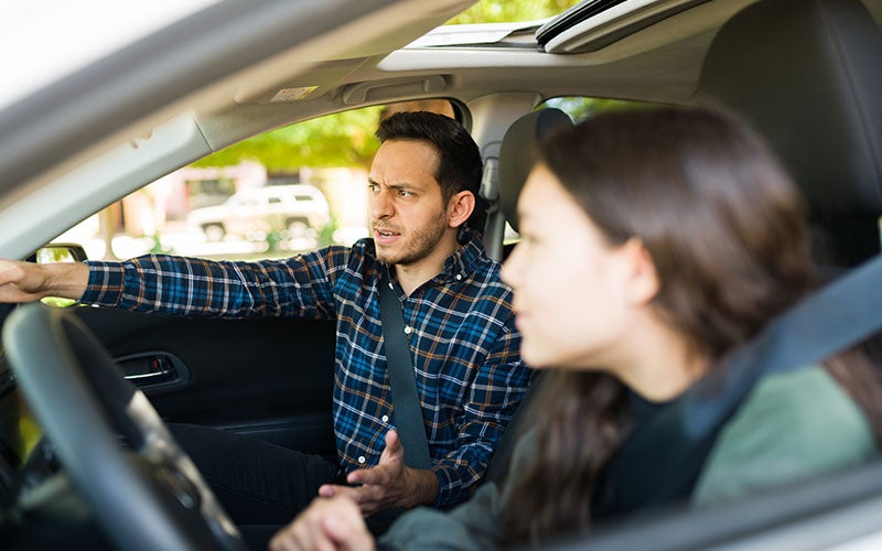 Couples arguing in car